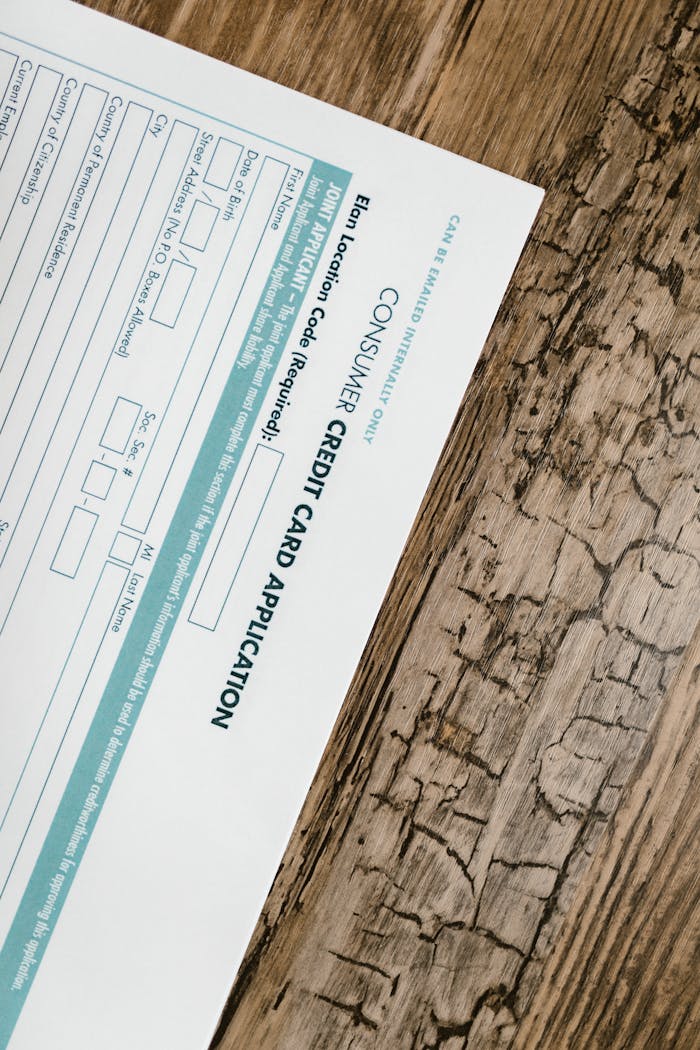 Credit Card Application Form on Wooden Surface